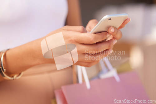 Image of Hands with smartphone, woman and shopping bag at mall for retail therapy with technology and communication. Mobile app, phone zoom and shopping, fashion and designer clothes at outdoor shopping mall.