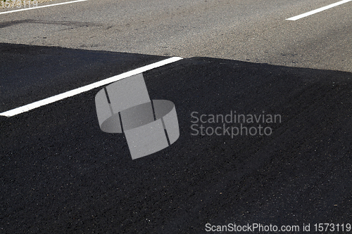 Image of repaired part of the paved road