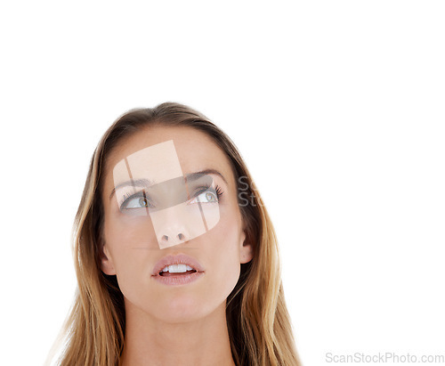 Image of Idea, think and woman with planning ideas with mock up in studio space. Young female mature face thinking alone and isolated with white background and mockup curious and looking up wondering