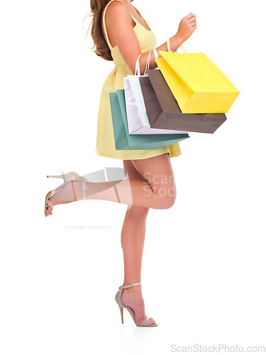 Image of Woman, bags and shopping for discount, sale and client isolated on white studio background. Female, shopper and customer with boutique items, expensive clothes and retail for fashion and high heels