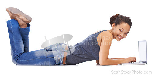 Image of Portrait, laptop and student relax on studio floor for research, learning and project on white background. Study, education and girl typing, internet and search for creative, online and isolated