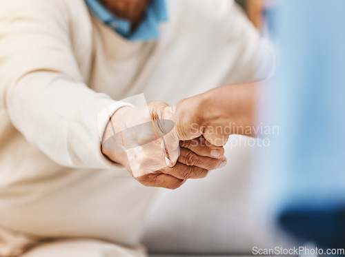 Image of Handshake, healthcare nurse and senior medical support, consultation greeting and caregiver in nursing home. Hello, thank you and hospital communication or patient agreement in retirement clinic