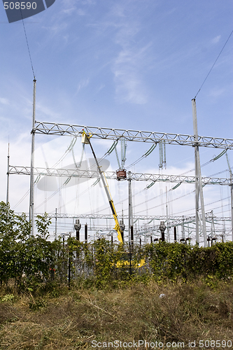 Image of repairing high voltage power lines