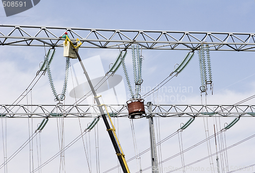 Image of repairing high voltage power lines