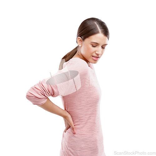 Image of Woman, studio and back pain from stress, burnout or spine health problem isolated on a white background. Female with bad body posture or muscle injury in studio for anatomy, fibromyalgia and massage