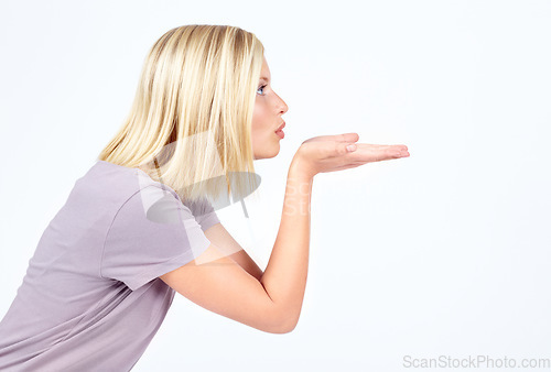 Image of Flirting profile and air kiss of girl contemplating, thinking and thoughtful for advertising. Attractive flirt and affection of isolated model blowing kisses on white background mock up.