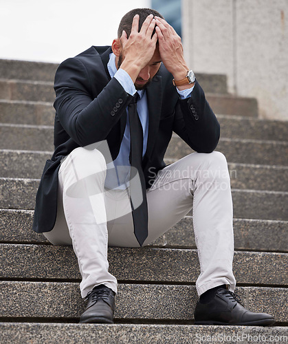 Image of Stress, depression and businessman with anxiety in city, corporate mistake and professional burnout in Singapore. Mental health, fail and employee sad about job loss, problem and resignation