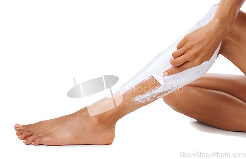 Image of Skincare, razor and cream on legs of girl shaving for cosmetic beauty, hair removal and self care. Hygiene, grooming and aesthetic shave of wellness girl with white studio mockup for advertising