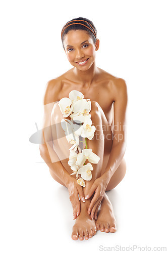 Image of Skincare, portrait and beauty of woman with flowers in studio on a white background mock up. Floral cosmetics, organic makeup and female model with orchids on legs for skin treatment and body care.