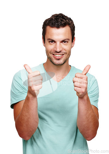 Image of Thumbs up, happy and portrait of a man in a studio with success, good news and agreement. Happiness, smile and handsome male model with a yes, ok and approval gesture isolated by a white background.