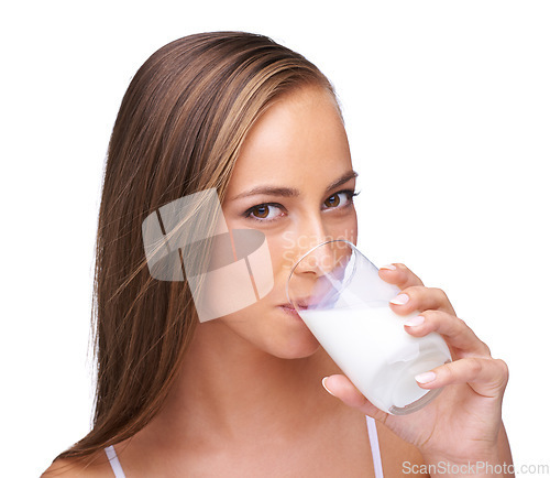 Image of Milk drink, glass and portrait of woman with white background, isolated studio and healthy diet. Face of female model, dairy product and organic breakfast for protein, calcium or vitamins of wellness