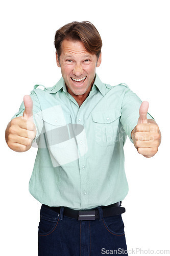 Image of Man, thumbs up and smile in studio portrait with casual fashion, excited and yes by white background. Happy middle aged man, agreement and hand sign with success, isolated and happiness with shirt