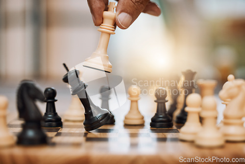 Image of Chess, man and hand with king from board game for winning strategy, tabletop tournament and sports games. Closeup chessboard, checkmate and smart move playing in contest, problem solving or challenge