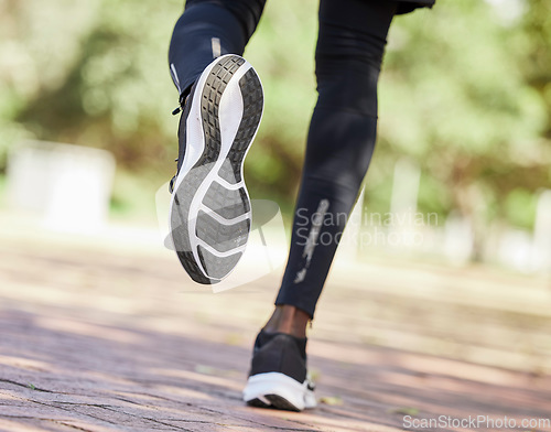 Image of Running, shoes and fitness with black man outdoor, run for healthy lifestyle and wellness with athlete and sport. Runner with sneakers, workout and body training with sports motivation and cardio