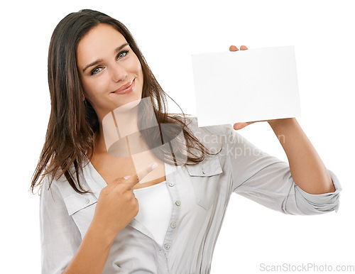 Image of Woman pointing to mockup poster for advertising, marketing or branding sign on isolated white background. Studio portrait of a model hand holding paper or card with empty space for design mock up