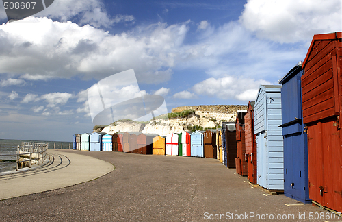 Image of colorful seaside promenade beach huts