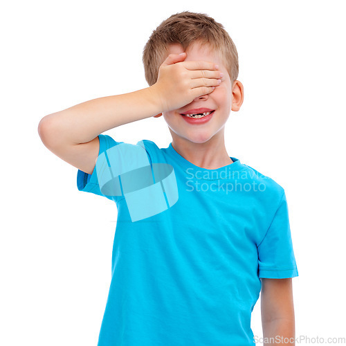 Image of Children, hide and seek and surprise with a boy in studio isolated on a white background covering his face with his hand. Kids, blind and game with a male child playing on blank advertising space