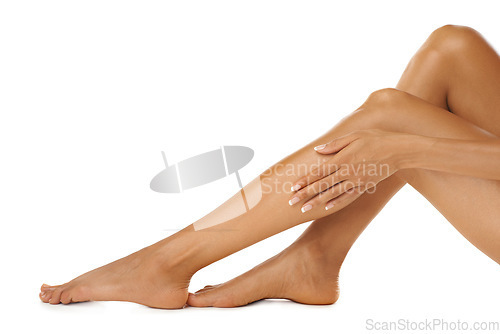 Image of Beauty, legs and woman in studio for grooming, hygiene and soft skin on white background. Leg, skincare and wellness model relax with luxury, treatment and cosmetics, feminine and cleaning routine