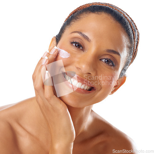 Image of Beauty cream, skincare and face of woman in studio on a white background. Portrait, makeup cosmetics and young female model apply facial lotion, creme or moisturizer for healthy skin and wellness.