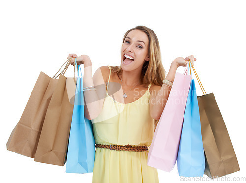 Image of Shopping bag, portrait and woman excited in studio, isolated white background and retail mall sales. Happy customer, model and shopping in commerce market, discount promotion and luxury store brand