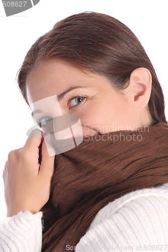 Image of beautiful young a woman with brown scarf 