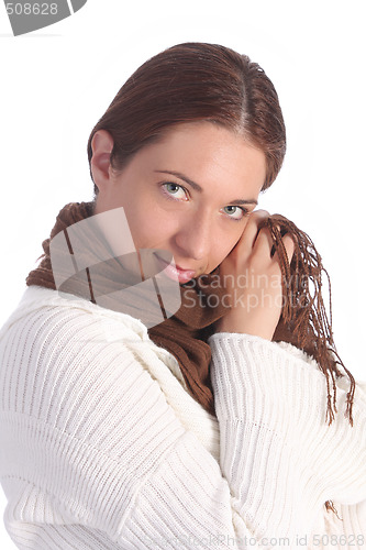 Image of beautiful young a woman with brown scarf 