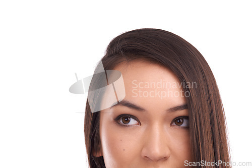 Image of Face of a model looking up at mockup space in a studio for product placement or marketing. Beauty, young and natural woman from Asia with empty mock up for advertising isolated by a white background.