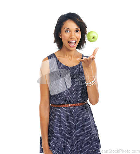 Image of Woman, portrait and throwing apple for nutrition, diet and wellness food for health lifestyle. Happy black woman with fruit for healthy habits marketing in white studio with mockup for wellbeing