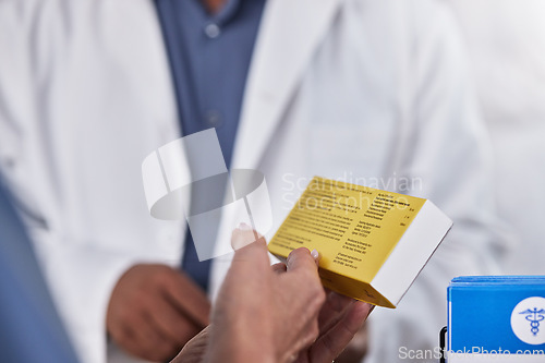 Image of Medication, pill box and doctor with a patient discussing a medical treatment in the hospital. Medicine, professional and healthcare specialist in consulting for prescription drugs in medicare clinic