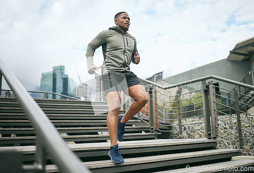 Image of Exercise, stairs and black man training, city or workout for fitness, fresh air or wellness. Nigerian male, trainer or athlete on steps, prepare for competition or running for energy, power or cardio