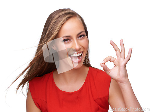 Image of Good job. Yes, ok and portrait of girl with hand emoji for happiness in approval, success and opinion. Young and beautiful model confident in agreement with happy smile at isolated white background.