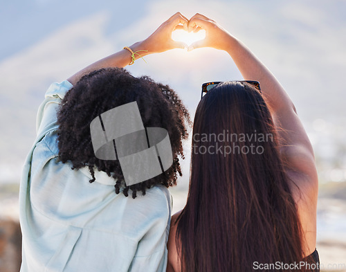 Image of Women back, heart and hands together for beach travel holiday, summer vacation and relax quality time friendship. Friends, love sign emoji and happiness lifestyle for ocean sunshine or adventure