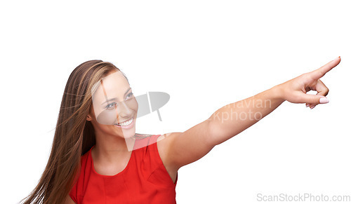 Image of White background, pointing finger and face of woman for advertising, marketing and fashion. Beauty, cosmetics and girl model with copy space for deal, sale and product placement isolated in studio