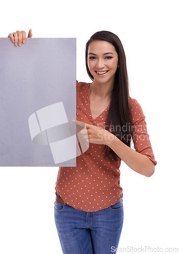 Image of Mockup, portrait and woman pointing at poster, placard or billboard for promotion, advertising or product placement. Marketing sign, banner space or sales girl with studio mock up on white background