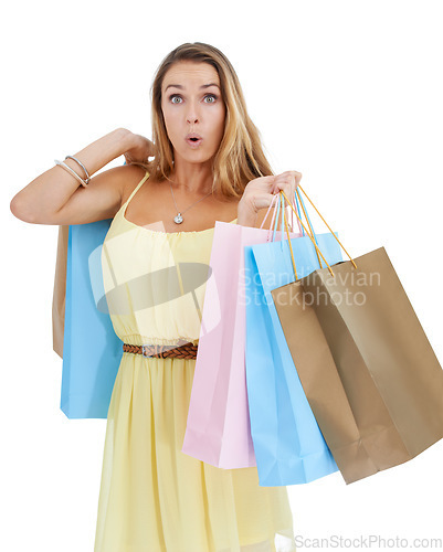 Image of Portrait, shocked and woman with bags, shopping and luxury boutique items with client isolated on white studio background. Female, shopper and customer surprised, expensive items or sale for discount