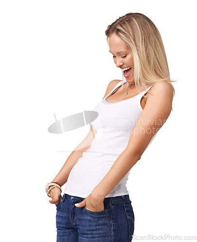 Image of Happy, smile and mockup with a woman in studio on a white background standing hands in pockets in casual clothing. Style, clothes and an excited young female posing in denim jeans and a tank top