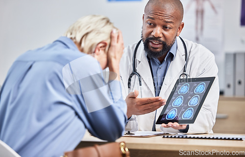 Image of Healthcare, brain scan on tablet and doctor with woman depressed, sad and worried about medical results in clinic. Hospital, neurology and medic worker with patient in consultation for x ray report