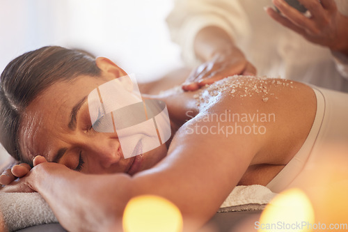 Image of Body scrub, spa and woman with massage and skincare with therapist, holistic treatment and self care with aromatherapy. Luxury, wellness health and peace to relax at salon, masseuse hands for zen