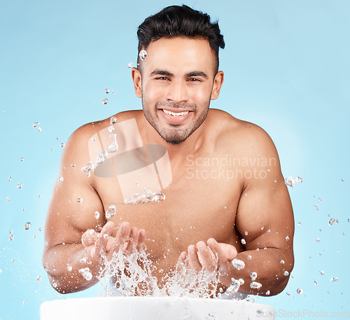 Image of Cleaning, water splash and portrait of man happy with self care routine, facial hygiene and body hygiene wash. Water drop, bathroom skincare hydration and beauty model with health wellness treatment