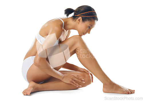 Image of Body care, beauty and woman in underwear in a studio with a wellness, skin care and natural routine. Cosmetic, spa and female model from Mexico with a smooth body treatment posing by white background