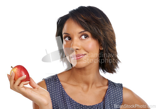 Image of Fruit, thinking or black woman eating an apple in studio on white background with marketing mockup space. Choices, ideas or thoughtful African girl advertising a healthy natural diet for wellness