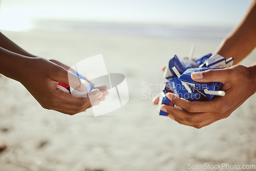 Image of Cleaning, plastic and hands of volunteer at beach for recycle, environment or earth day. Recycling, sustainability and climate change with charity team and trash for pollution, eco friendly and help