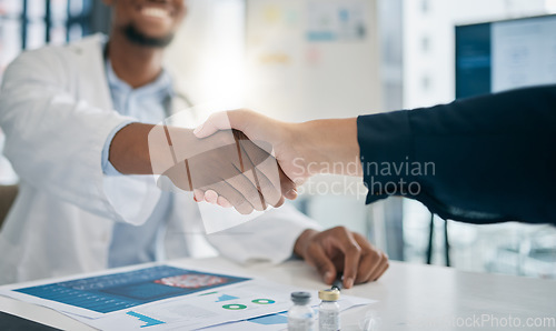 Image of Doctor, handshake and meeting with patient, smile and greeting for vaccination education, talk or help. Black man, doctors and shaking hands with client for wellness, healthcare or medicine in clinic