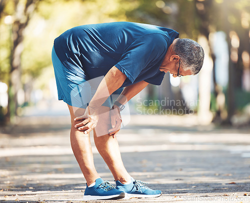 Image of Exercise, senior man and tired outdoor, breathing and balance for wellness, health and retirement. Elderly male, athlete and resting for workout, runner and exhausted for fitness, training and cardio