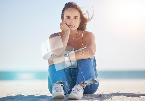 Image of Sad, thinking and depression with woman at beach feeling stress, exhausted and problems. Mental health, crisis and anxiety with depressed girl alone with frustrated, worry and confused by the sea