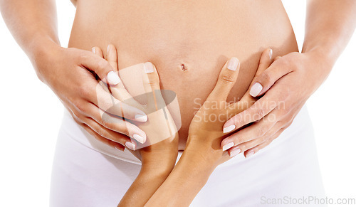 Image of Pregnancy, partner hands and support on stomach for baby wellness, mother health and lifestyle together. Pregnant woman, mom and family trust, couple hope hand and love in white background studio