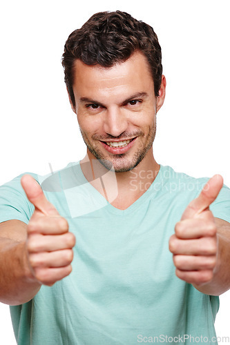 Image of Thumbs up, approval and portrait of a happy man in a studio with success, good news and agreement. Happiness, smile and male model with a yes, ok and satisfaction gesture isolated by white background