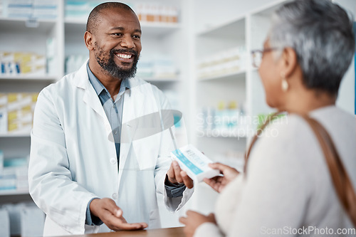 Image of Healthcare, pharmacist and woman at counter with medicine or prescription drugs in hands at drug store. Health, wellness and medical insurance, man and customer at pharmacy for advice and pills.