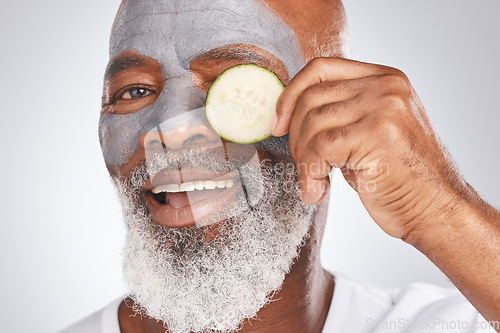 Image of Skincare, face mask or old man portrait with cucumber marketing or advertising natural vegan diet for glowing skin. Cream, happy, senior black man with beauty or healthy anti aging facial cosmetics