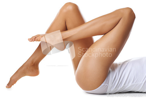 Image of Skincare, woman and dermatology for legs, wellness and cosmetics isolated on white studio background. Female, lady or natural beauty for leg, feet or fitness for luxury, smooth treatment or self care